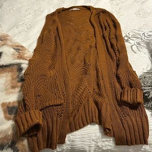 Burnt orange cardigan with beautiful detailing. Size x-small